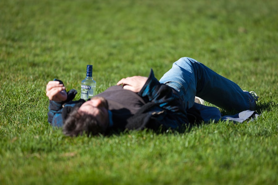 A Person Lying On The Grass 